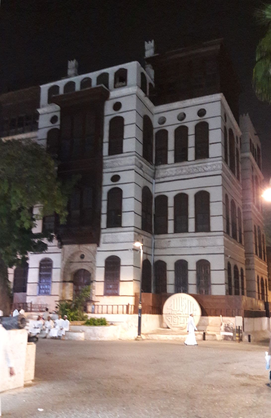 Nasseef House rising above a street in Historic Jeddah / بيت نصيف يعلو شارعاً في جدة التاريخية